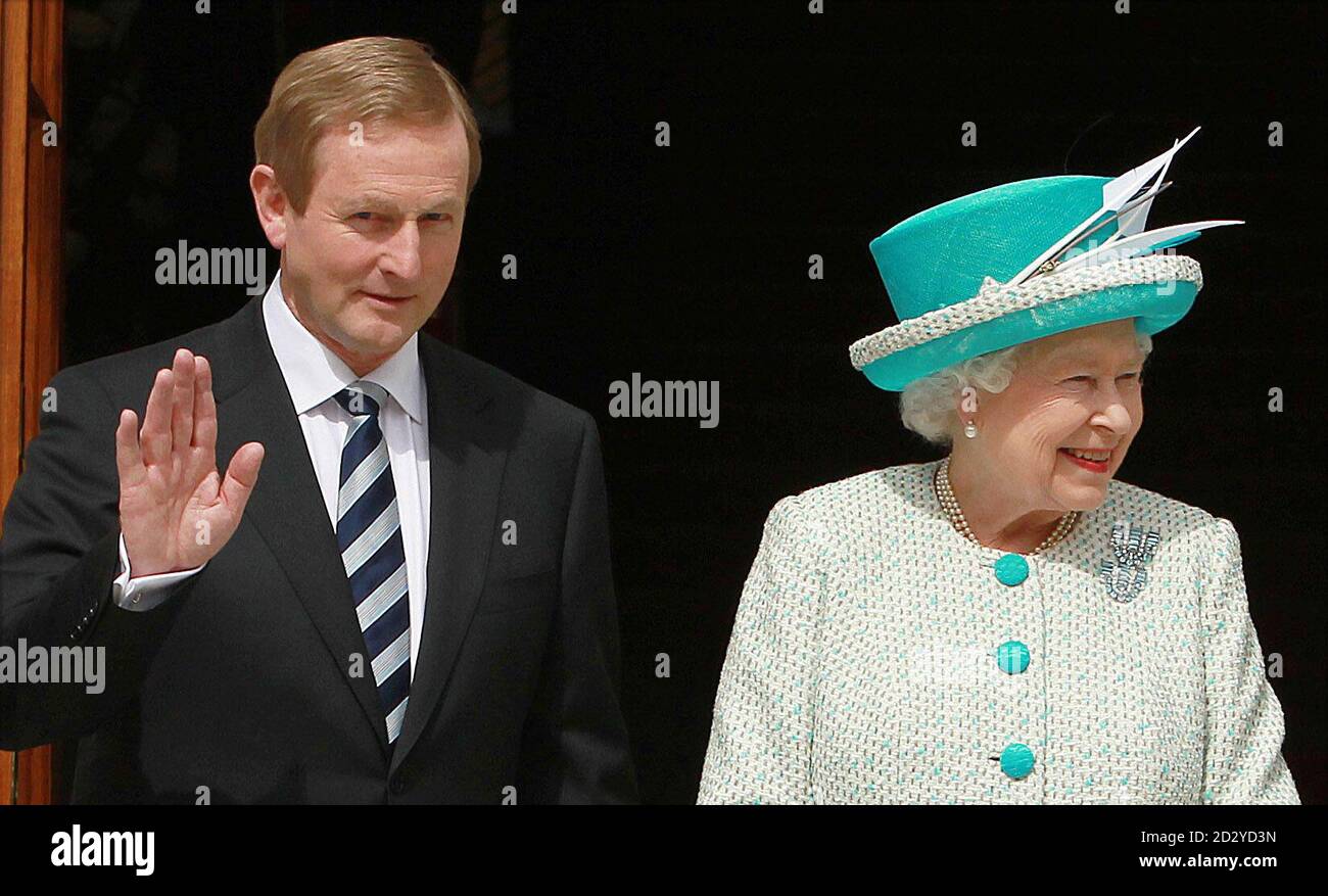 ALTERNATIVE CROP  Taoiseach Enda Kenny with Queen Elizabeth II to Government Buildings, Dublin, during the second day of her State Visit to Ireland. PRESS ASSOCIATION Photo. Picture date: Wednesday May 18, 2011. See PA story IRISH Queen. Photo credit should read: Julien Behal/PA Wire Stock Photo