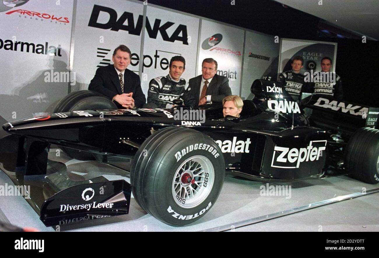 Formula One Driver Mika Salo Takes The Wheel With John Barnard Technical Directo Left To Right Pedro Diniz And Tom Walkinshaw Team Director With The Danka Arrows Formula One 1998 Car During Formula One Driver Mika Salo Takes The Wheel With John Barnard Technical Directo Left To Right Pedro Diniz And Tom Walkinshaw Team Director With The Danka Arrows Formula One 1998 Car During