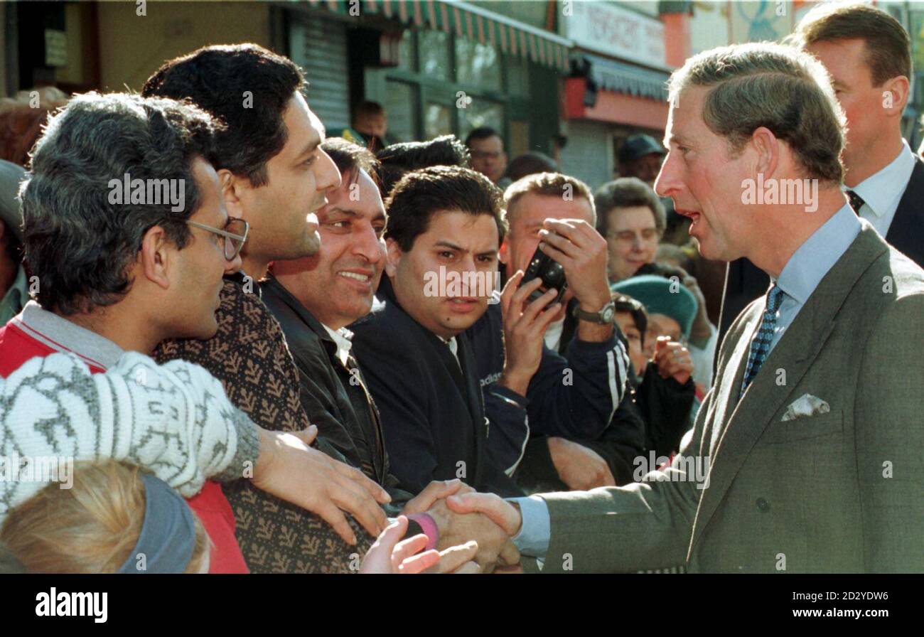 The Prince of Wales talks with local people after leaving the headquarters of SARI (Support Against Racist Incidents) in Easton, Bristol today (Tuesday).  Photo Barry Batchelor/PA. Stock Photo
