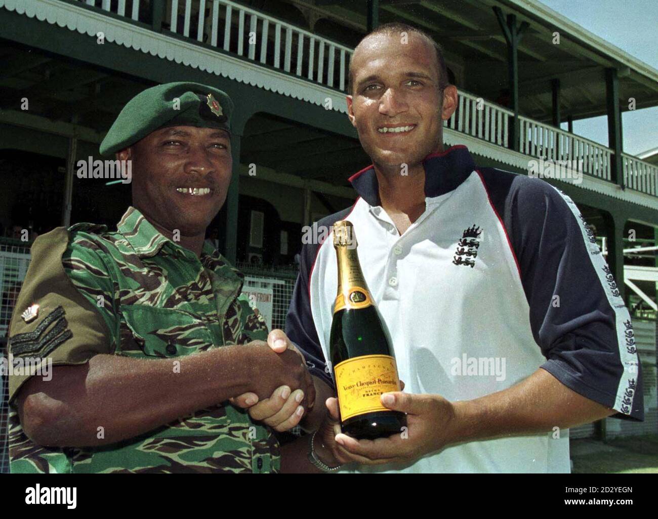 Staff Sergeant Errol Thompson of the Guyana Defence Force congratulates