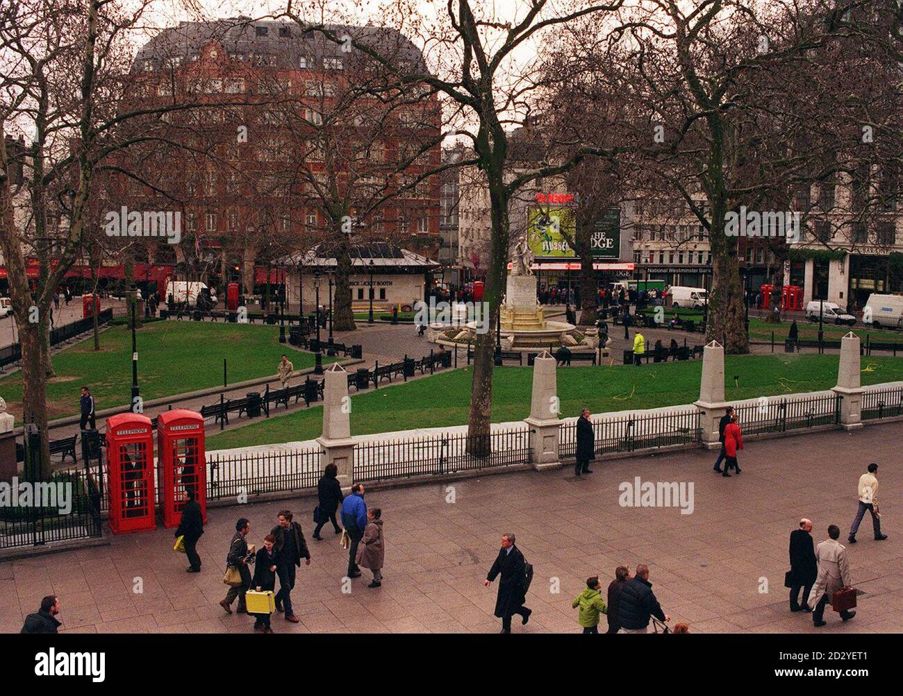 Leicester Square in London boast the busiest public phone boxes in Britain where thousands of calls are made each day.    Fourteen traditional style red boxes designed by Sir Giles Scott in 1924 sit alongside six newer aluminium boxes. Stock Photo