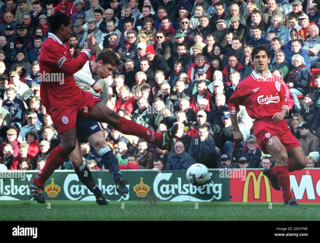 Bolton's Alan Thompson beats Liverpool Captain Paul Ince to put Bolton