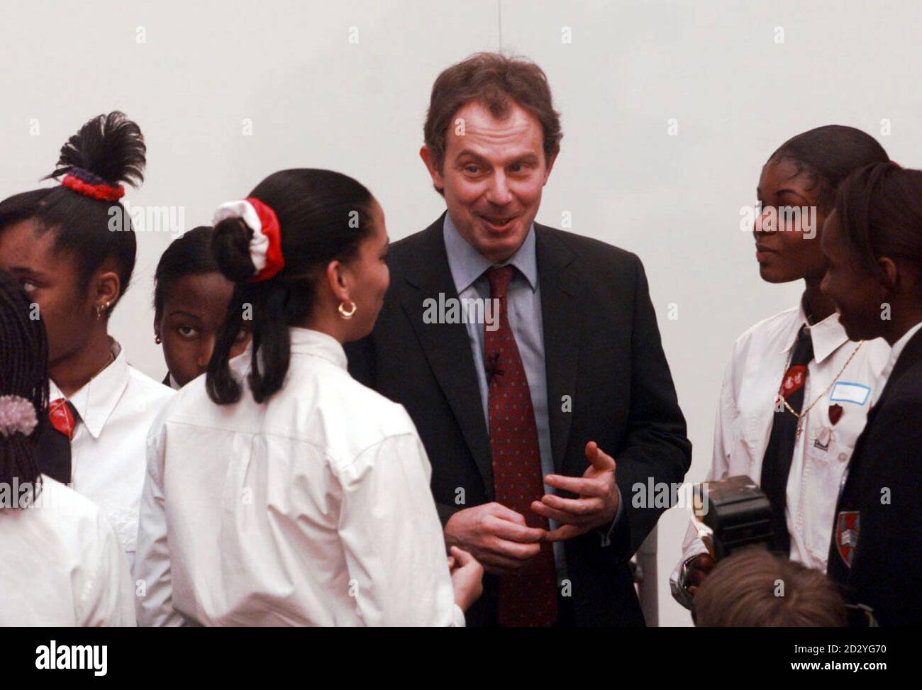 Budget Question Time with the Prime Minister Tony Blair talking to pupils after answering questions with the Chancellor of the Exchequer Gordon Brown at the Geoffrey Chaucer School in Southwark, London Stock Photo