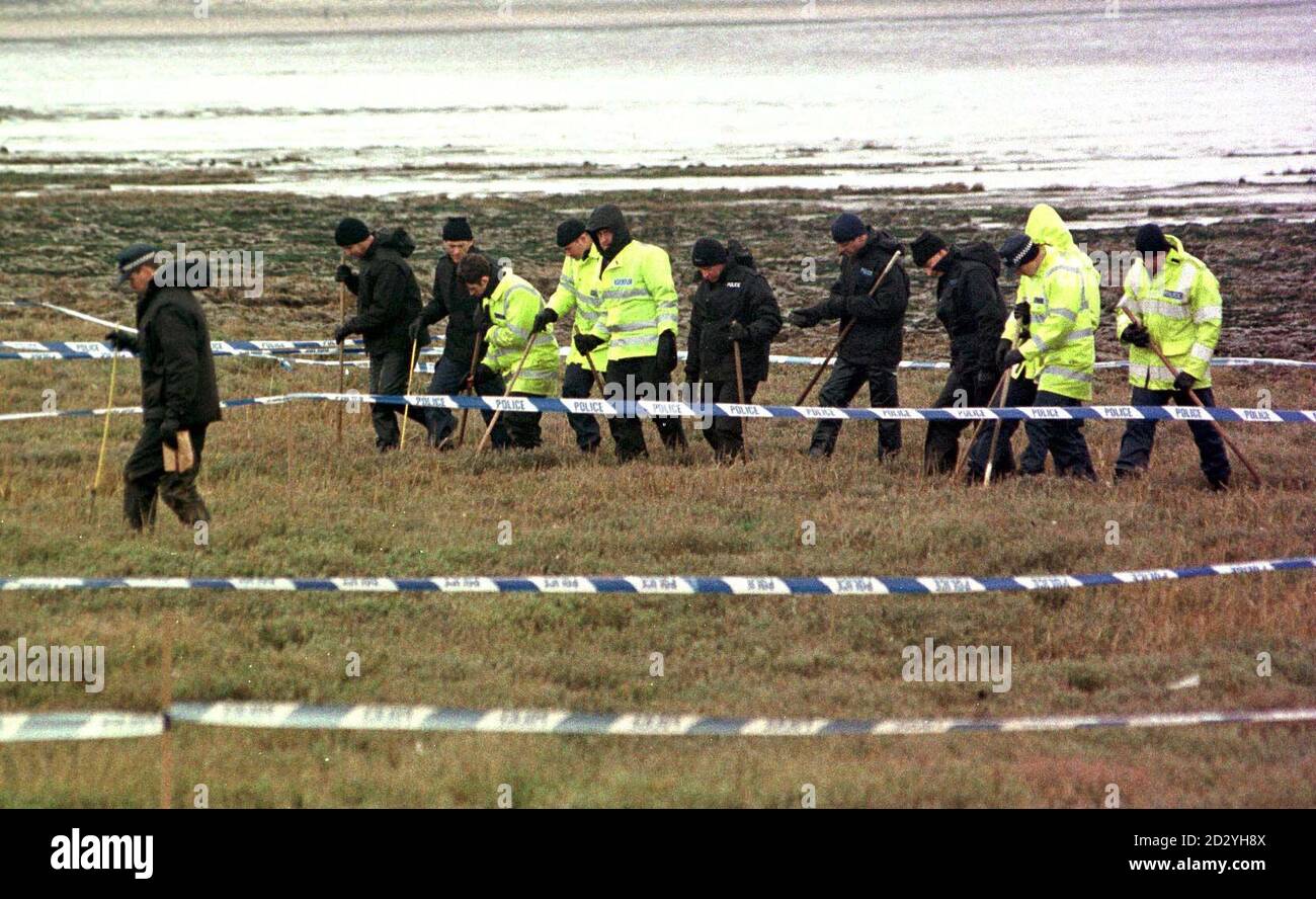 Police officers examine the scene today (Thursday), near where Kirsty Carver's body was found on Spurn Point, Humberside. See PA Story POLICE Missing. Photo by Paul Barker/PA Stock Photo