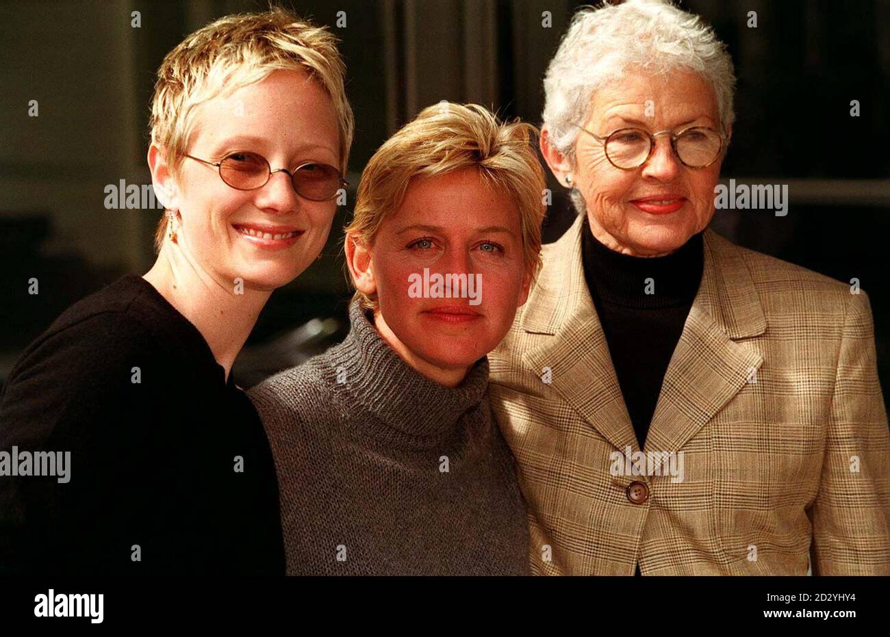 PA NEWS PHOTO 20/4/98 ACTRESS ELLEN DEGENERES STAR OF CHANNEL 4  TELEVISION'S SERIES "ELLEN" (CENTRE) POSES WITH HER PARTNER ANNE HECHE AND  HER MOTHER BETTY AT A PHOTOCALL IN LONDON TO PROMOTE