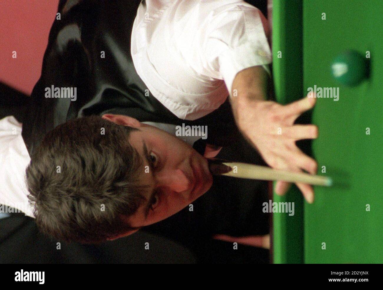 Ronnie OSullivan lines up a shot on his way to a substantial lead over Jimmy White in their Quarter Final Match in the Embassy World Snooker Championships today (Tuesday)