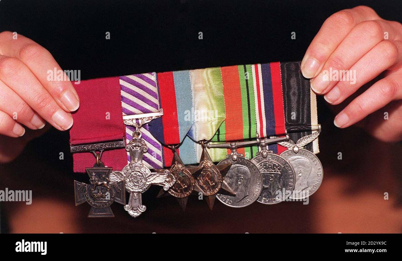 The VC, DFC and Campaign Medals awarded to Flying Officer Lloyd Trigg, of the Royal New Zealand Air Force, which fetched  120,000 at Spinks' 'Aviation Collection' auction today (Wed). The posthumous VC was awarded to FO Trigg following his destruction of a U-boat off the West African coast, in August 1943, from a blazing Liberator bomber. See PA story SALE VC. Photo by Ben Curtis/PA Stock Photo