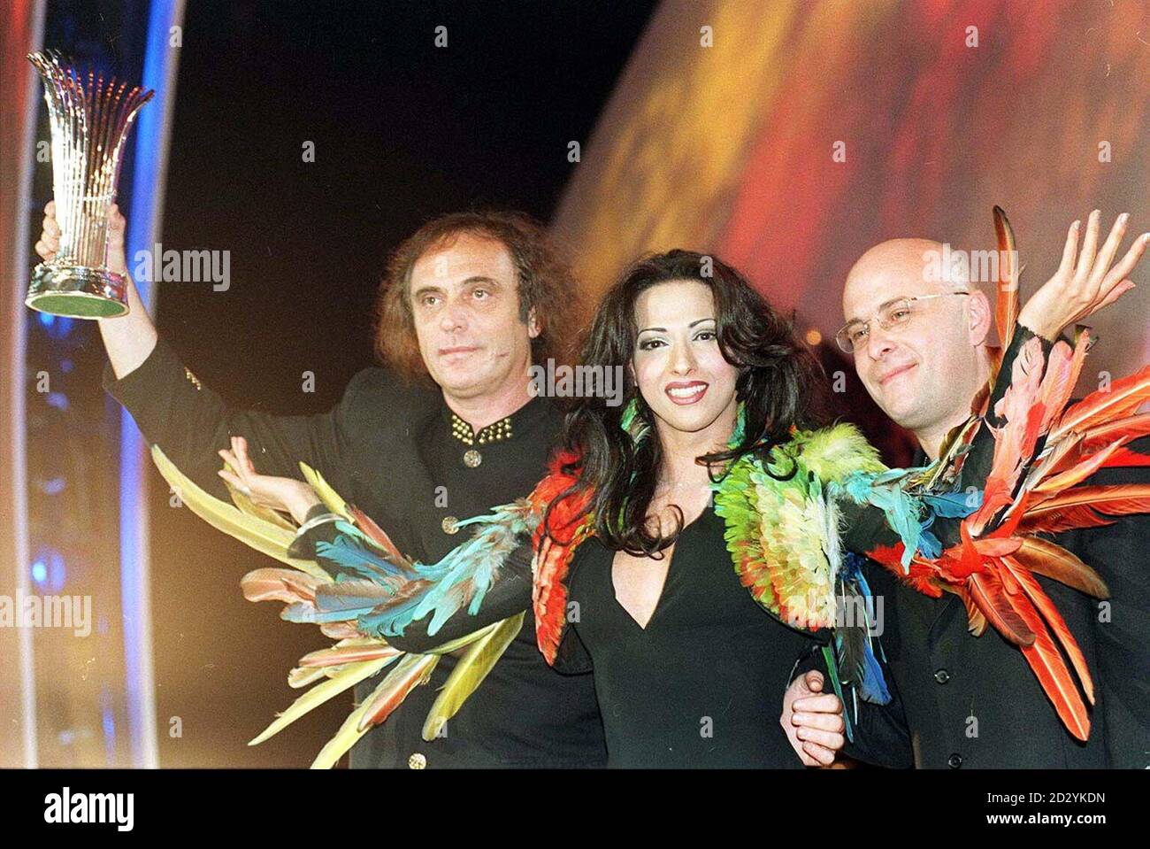 Eurovision song contest winner Dana International of Israel with composer Sviika Pick (left) and lyricist Yoav Ginal after the competition at the NIA, Birmingham. Stock Photo