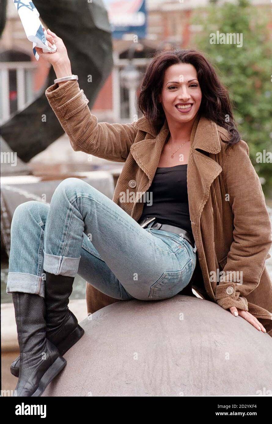 Dana International winner of the Eurovision Song Contest for Israel celebrates during a photocall in Birmingham today (Sunday). Stock Photo