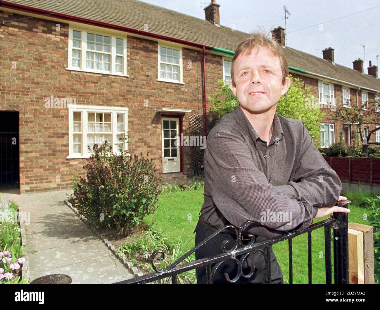 John Halliday, the first custodian of 20, Forthlin Road, the former home of Paul McCartney, outside the premises in Liverpool which are to be opened by the National Trust today (Wednesday). Photo by Dave Kendall/PA. Stock Photo
