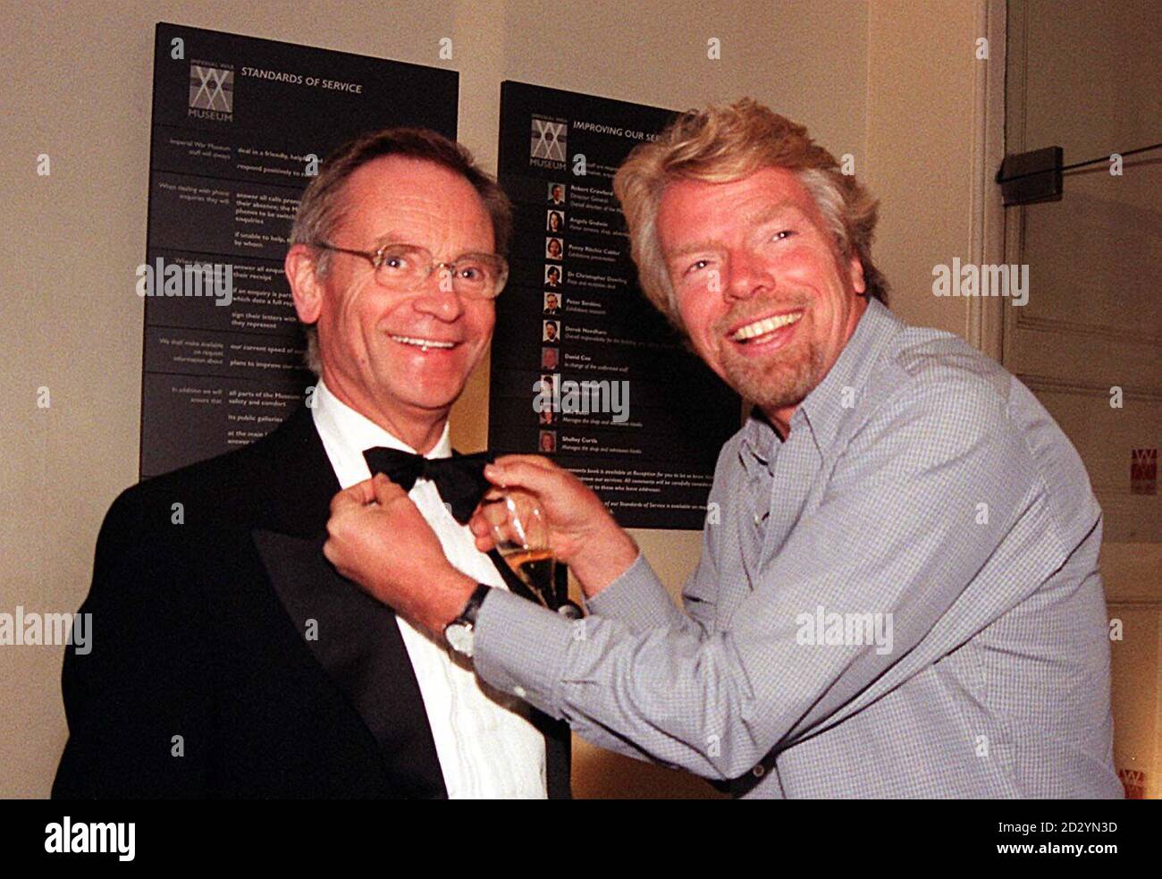 Lord Archer (left) gets the treatment from Virgin boss Richard Branson at  the London Broncos' annual Summer Ball at the Imperial War Museum in London  this evening (Saturday). Photo by Tony Harris/PA>