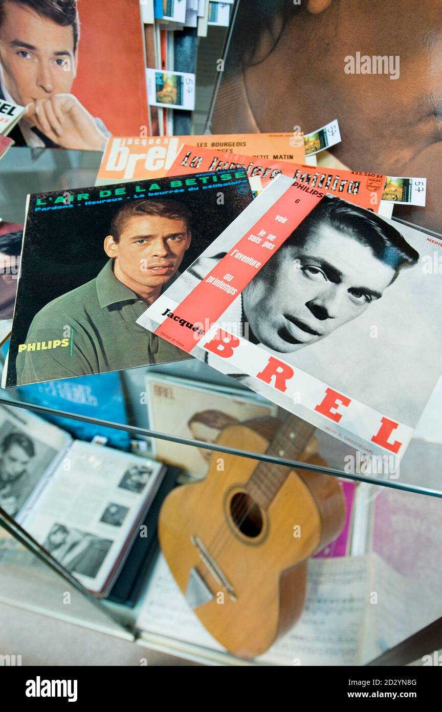 Jacques Brel's personal effects are displayed during an exhibition at Sotheby's auction house in Paris October 3, 2008. Manuscripts, recordings, photographs and personal belongings, which include his pilots' licence, his wallet, and his pipe, will be auctioned during a sale at Sotheby's auction house October 8, 2008.    REUTERS/Gonzalo Fuentes  (FRANCE) Stock Photo
