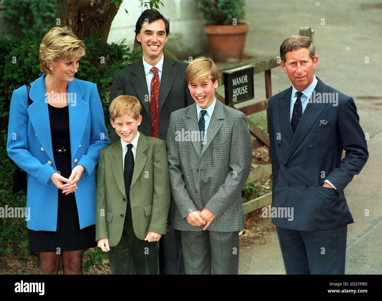 The Prince And Princess Of Wales And Their Sons Prince William And Prince Harry In Good Humour As They Face The Media Outside Manor House With House Master Dr Andrew Gailey Centre