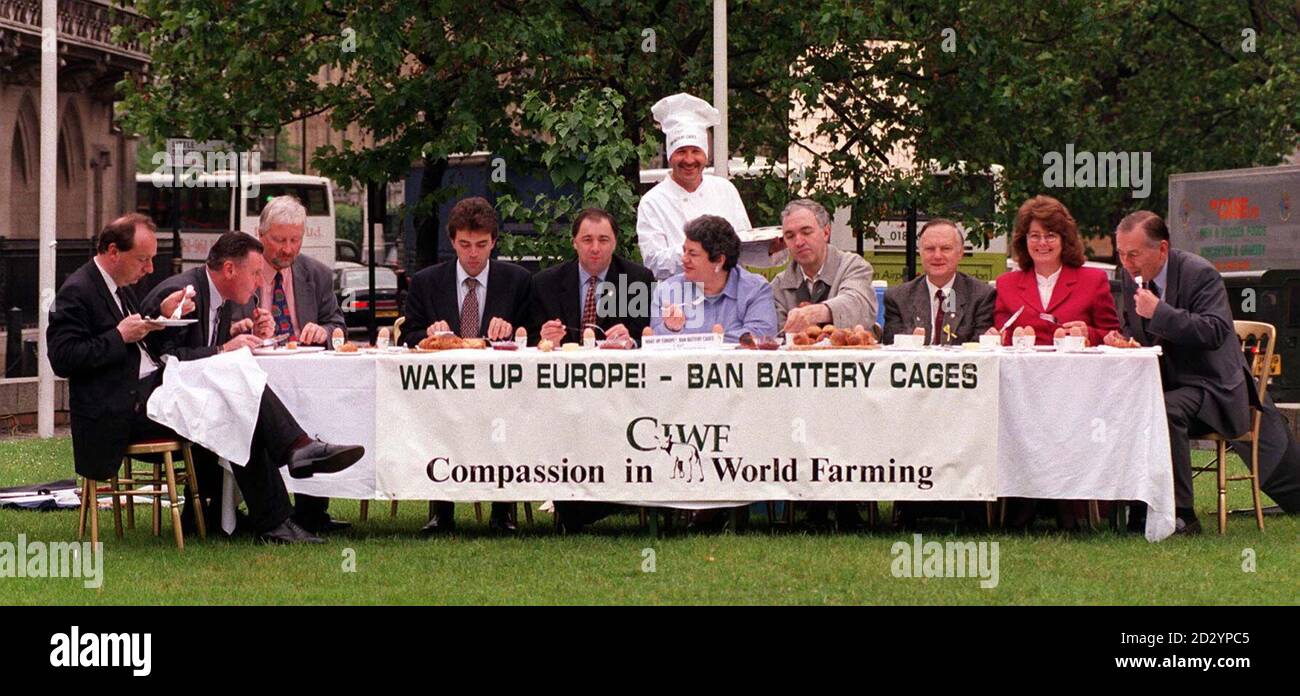 MPs tuck into organic free-range eggs for breakfast, prepared by chef John Callaghan, at the QEII Centre in Westminster today (Wed), as MPs from all parties supported the campaign by Compassion in World Farming to end the battery cage system for hens. L to r: Norman Baker, Vernon Coaker, Nigel Jones, Roger Gale, Tom Brake, Ivor Caplin, Jackie Ballard, Nick Palmer, Bill Etherington, Jackie Lawrence, Peter Bottomley. See PA story POLITICS Eggs. Photo by Tony Harris/PA Stock Photo