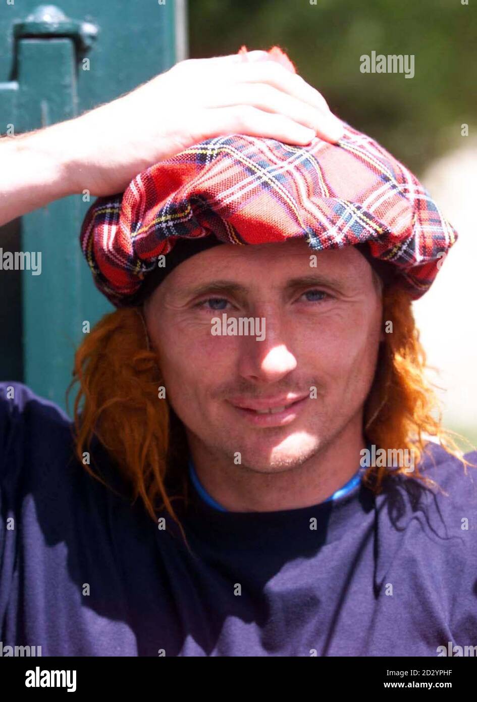 Scotland's Tom Boyd in light-hearted mood sports a 'Jimmy Hat' during a news conference in St. Remy, France today (Sunday). The Scotland squad are due fly on to Bordeaux tomorrow for their second match of the World Cup against Norway on Tuesday. EDI Photo by Chris Bacon/PA Stock Photo