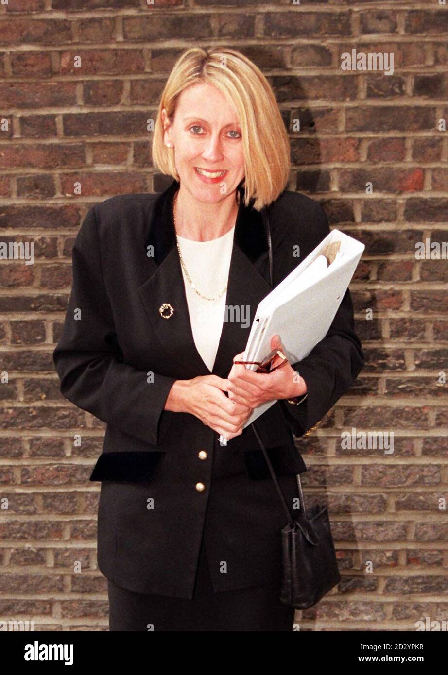 CPS lawyer Penny Scholfield smiles briefly for the benefit of the