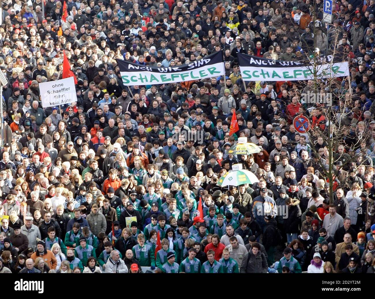 Around 5,000 employees and their families of German company Schaeffler  Group, the world's second largest ball-bearing maker, take part at a  demonstration in Herzogenaurach, near Nuremberg in this February 18, 2009  file