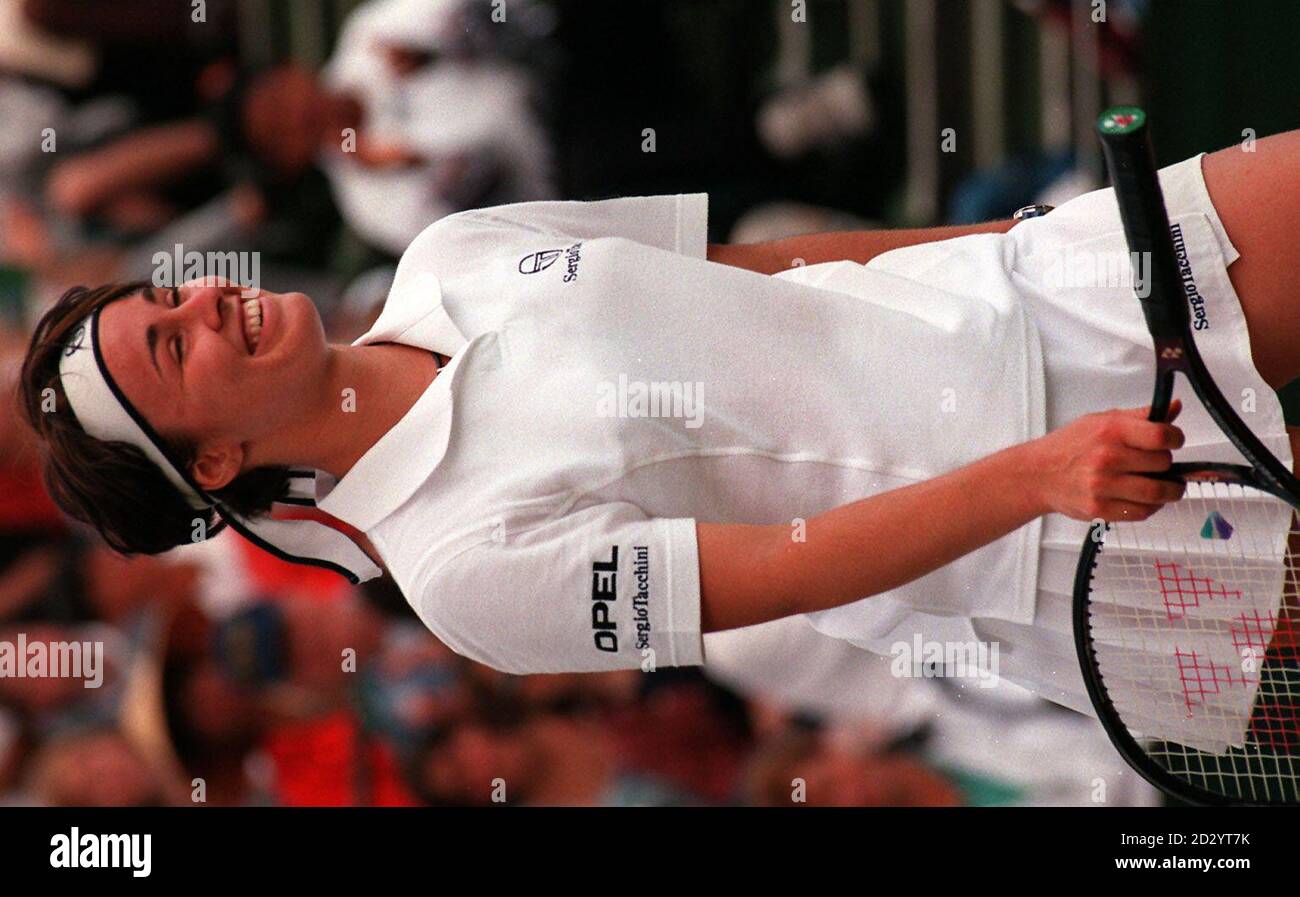 Martina Hingis of Switzerland looks cheerful after she won her match against Tamarie Tanasugarn of Thailand, 6-3,6-2 to go into the quarter finals at Wimbledon today (Tuesday). Photo Mike Stephens/PA Stock Photo