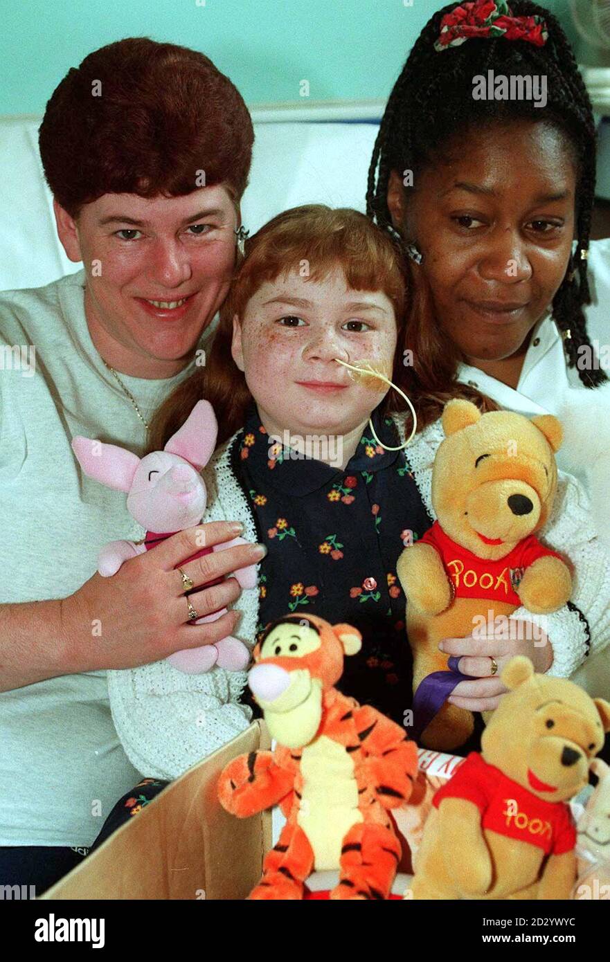 Triple organ transplant patient six-year-old Adele Chapman prepares to return home from Birmingham Children's Hospital today (Monday), aided by mum Doreen and nurse Maxine Pryce (right) Picture DAVID JONES/PA Stock Photo