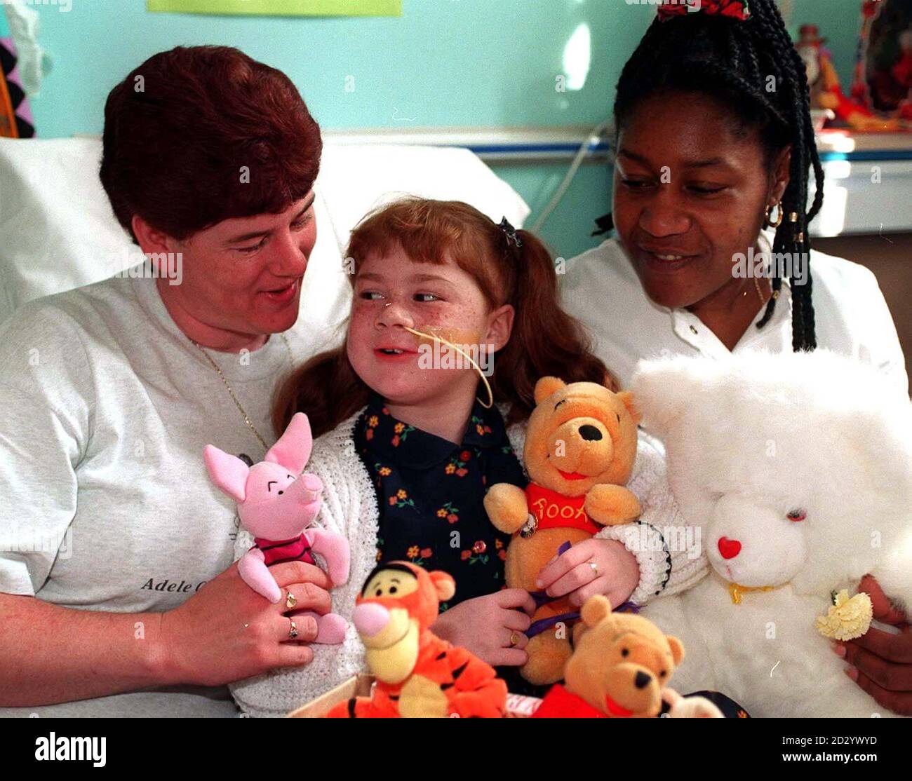 Triple organ transplant patient six-year-old Adele Chapman prepares to return home from Birmingham Children's Hospital today (Monday), aided by mum Doreen and nurse Maxine Pryce (right) Picture DAVID JONES/PA Stock Photo