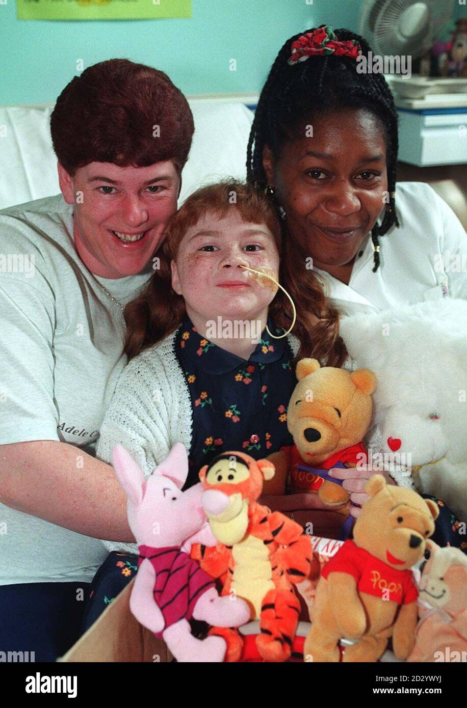 Triple organ transplant patient six-year-old Adele Chapman prepares to return home from Birmingham Children's Hospital today (Monday), aided by mum Doreen and nurse Maxine Pryce (right) Picture DAVID JONES/PA Stock Photo