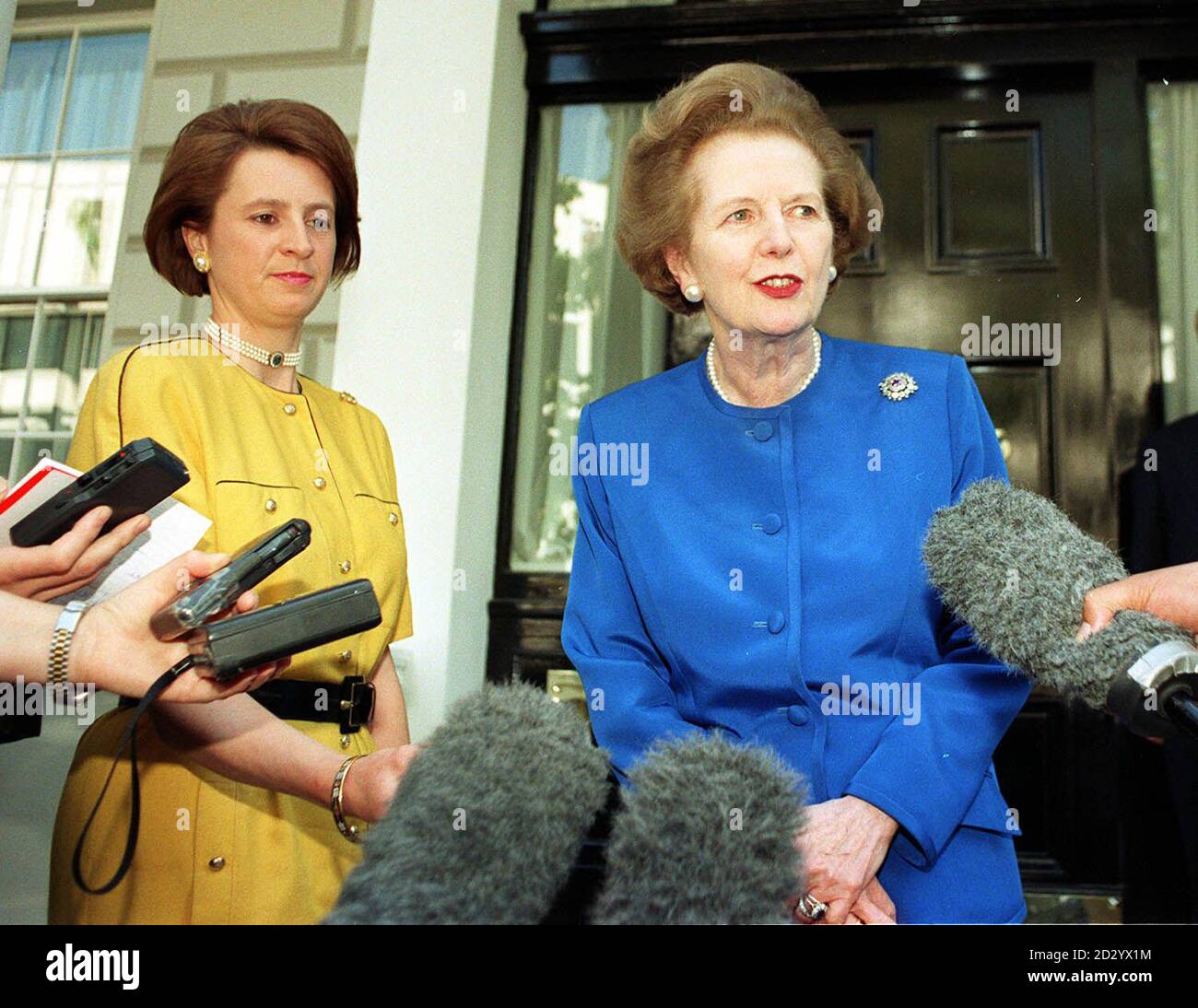 Previously unissued library filer dated 2/5/97 of Elizabeth Buchanan (left) and former Prime Minister Baroness Thatcher.  Elizabeth Buchanan, 36, was named Thursday 23 July 1998 as Assistant Private Secretary to the Prince of Wales.  As well as working as an aide to the former Conservative Prime Minister she has been an adviser to two former Cabinet Ministers.  She will start work at St James's Palace in October, where her portfolio will include responsibilities for the Prince's charities working in the community and with young people, and covering the Prince's interests in the environment, in Stock Photo