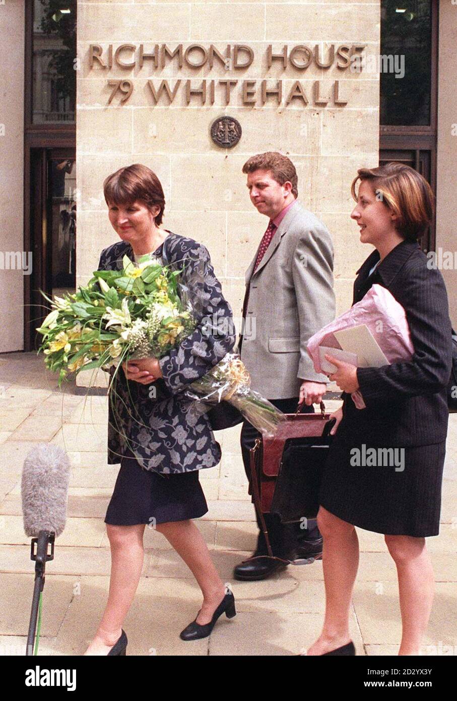 Harriet Harman carries a bouquet as she leaves her office at Richmond House, after being dismissed as Social Security Secretary following today's (Monday) Cabinet reshuffle. See PA story POLITICS Reshuffle. Photo by Rosie Hallam/PA Stock Photo