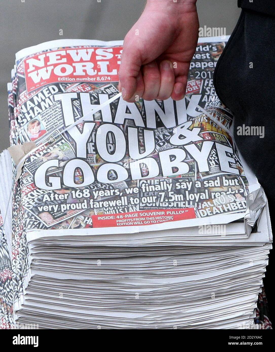 A bundle of the final copy of the News of the World newspaper are delivered to a shop in a shop in Stockport. Stock Photo