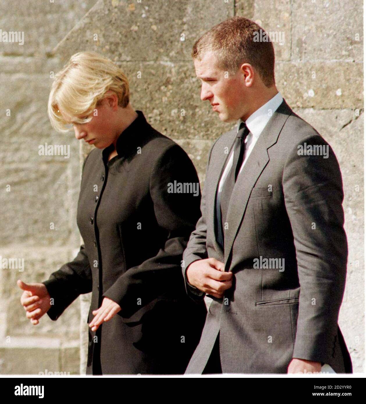 Peter and Zara Phillips, at the Funeral of their grandfather,  Major Peter Phillips, at  St Peter and St Paul church in the village of Great Somerford, Wiltshire, today (Friday). Photo by Tim Ockenden. See PA Story FUNERAL Phillips. Stock Photo