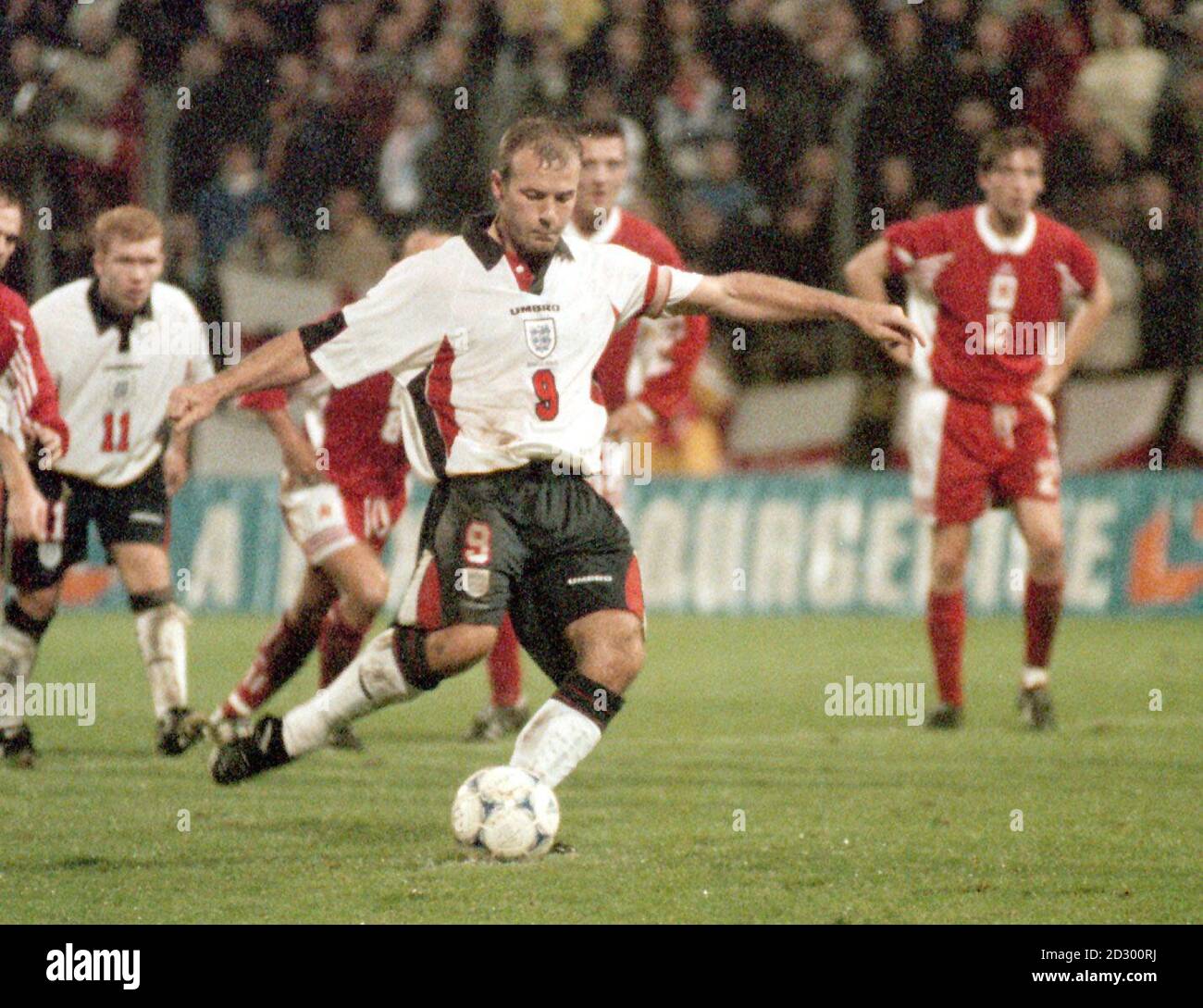 THIS PICTURE CAN ONLY BE USED WITHIN THE CONTEXT OF AN EDITORIAL FEATURE. Alan Shearer shoots from the penalty spot, giving England a 2-0 lead in the first half of tonight's Euro 2000 qualification game against Luxembourg. Picture by Neil Munns/PA Stock Photo