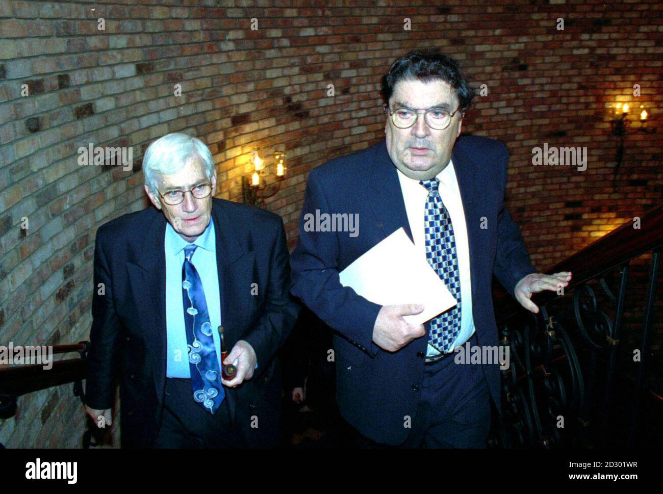 S.D.L.P. Leader John Hume (right) and Deputy First Minister Seamus Mallon make their way into their party's annual conference at the Canal Court Hotel Newry today (Saturday). Picture by Paul McCambridge P.A. Stock Photo
