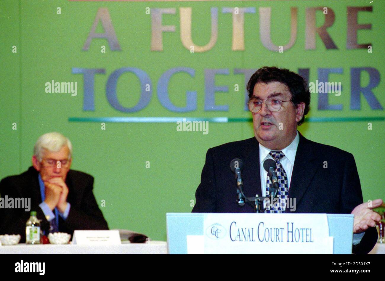 S.D.L.P Leader John Hume (right) receives a standing ovation from his party colleagues at the S.D.L.P. party conference at the Canal Court Hotel Newry today (Saturday). Photo by Paul McCambridge/PA. Stock Photo