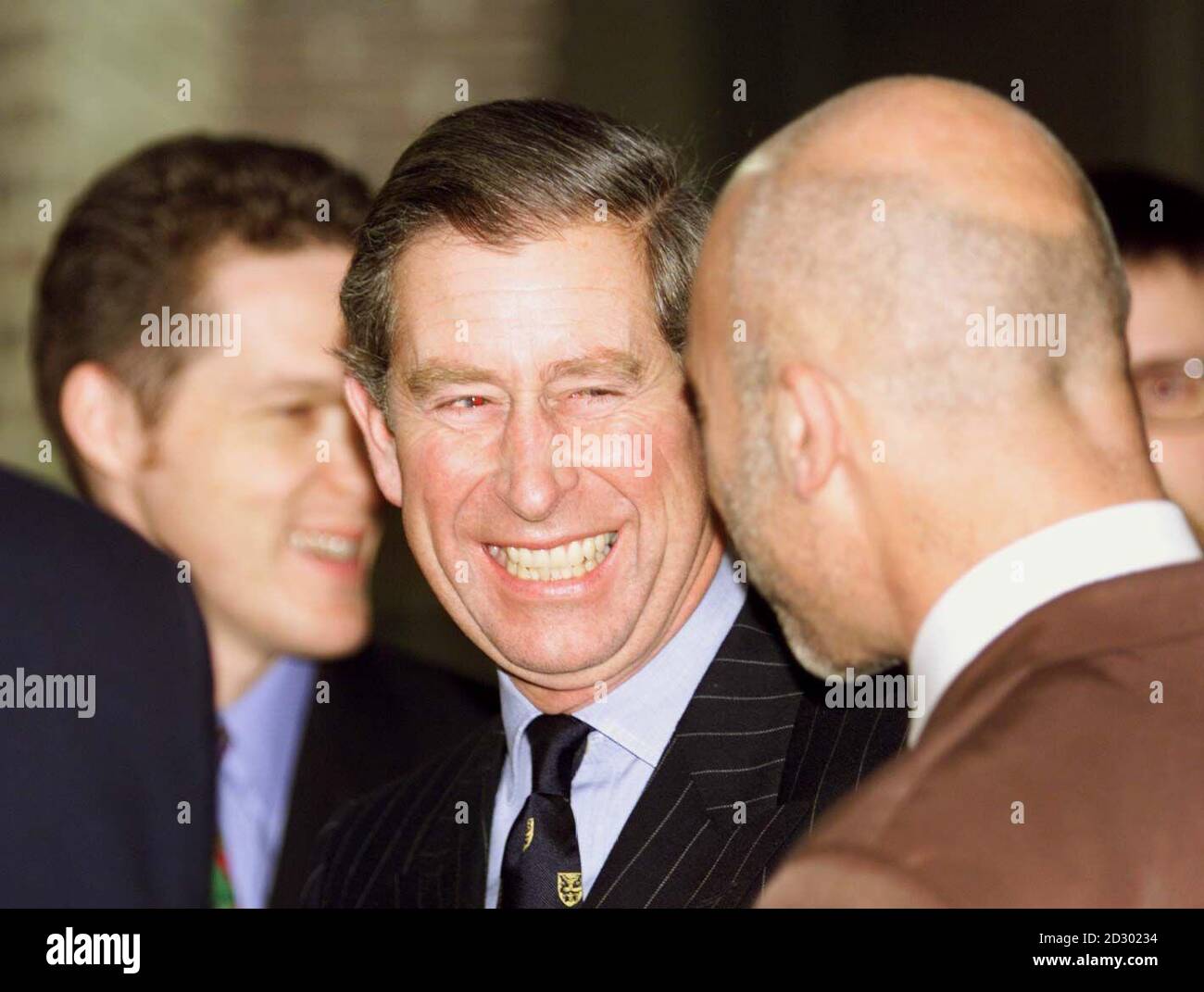 The Prince of Wales laughs with architect Nigel Coates (R), during a visit to the Geffrye Museum in east London November 18.The Princewas officially opening a new extension to the of the museum.    ph/Photo by Paul Hackett   REUTERS Stock Photo