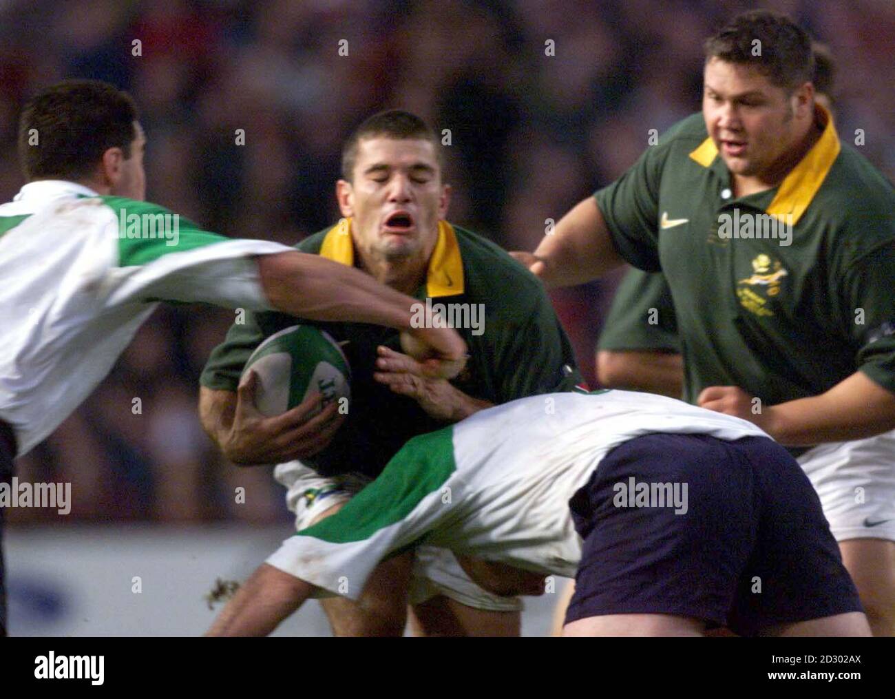 South Africas Joost van der Westhuizen finds a painful way through the Irish defence during the match at Lansdowne Road, Dublin today (Saturday)