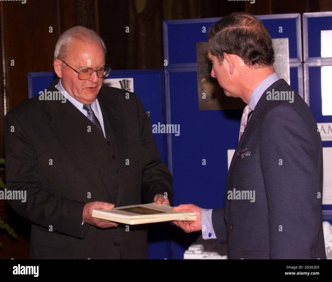 The Prince of Wales presents President Herzog of Germany with a copy of the report of the Prince's Potsdam Project, at the Palace of Holyroodhouse in Edinburgh today, December 2, 1998 during his four-day official state visit to the UK. The Potsdam Project is of international significance and is engaged in the study of urban development in a Europe-wide context.  WPA ROTA photo by Chris Bacon/PA Stock Photo