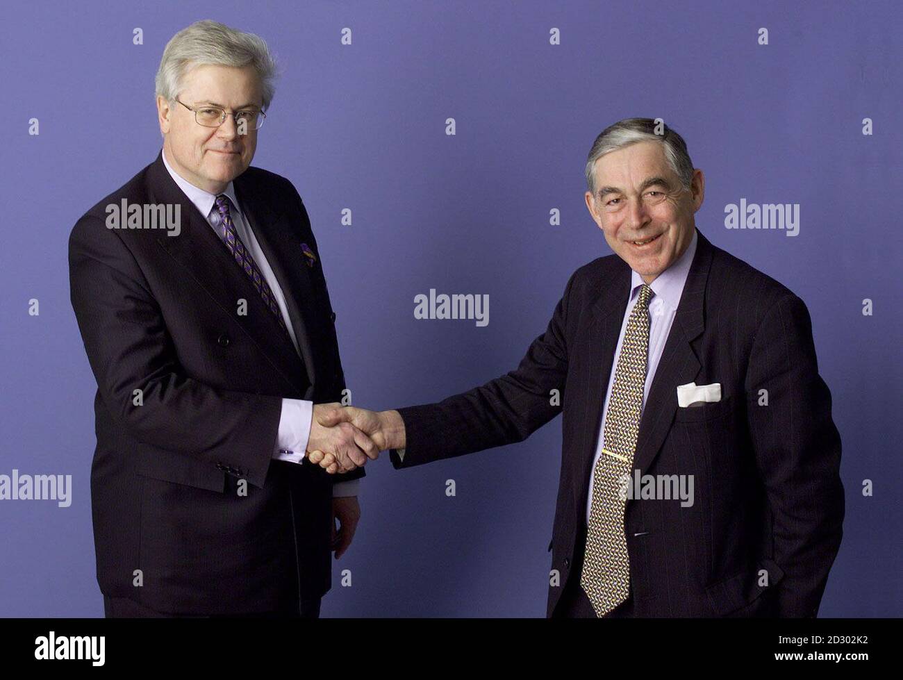 H kan Mogren (left), Chief Executive of Astra AB, Sweden, shakes hands with Sir David Barnes, Chief Executive of Zeneca Group PLC, UK, on today's (Wednesday) announcement of the merger of the two companies to form AstraZeneca, a powerful new global force in pharmaceuticals. Over 1000 jobs are set to go due to the merger. SEE PA Story CITY Zeneca. PA Picture. Stock Photo