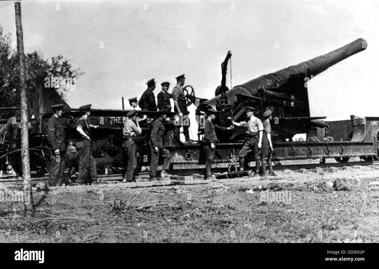 1916. : British artillerymen manning a 9.2' gun mounted on a flatbed railway truck. Stock Photo