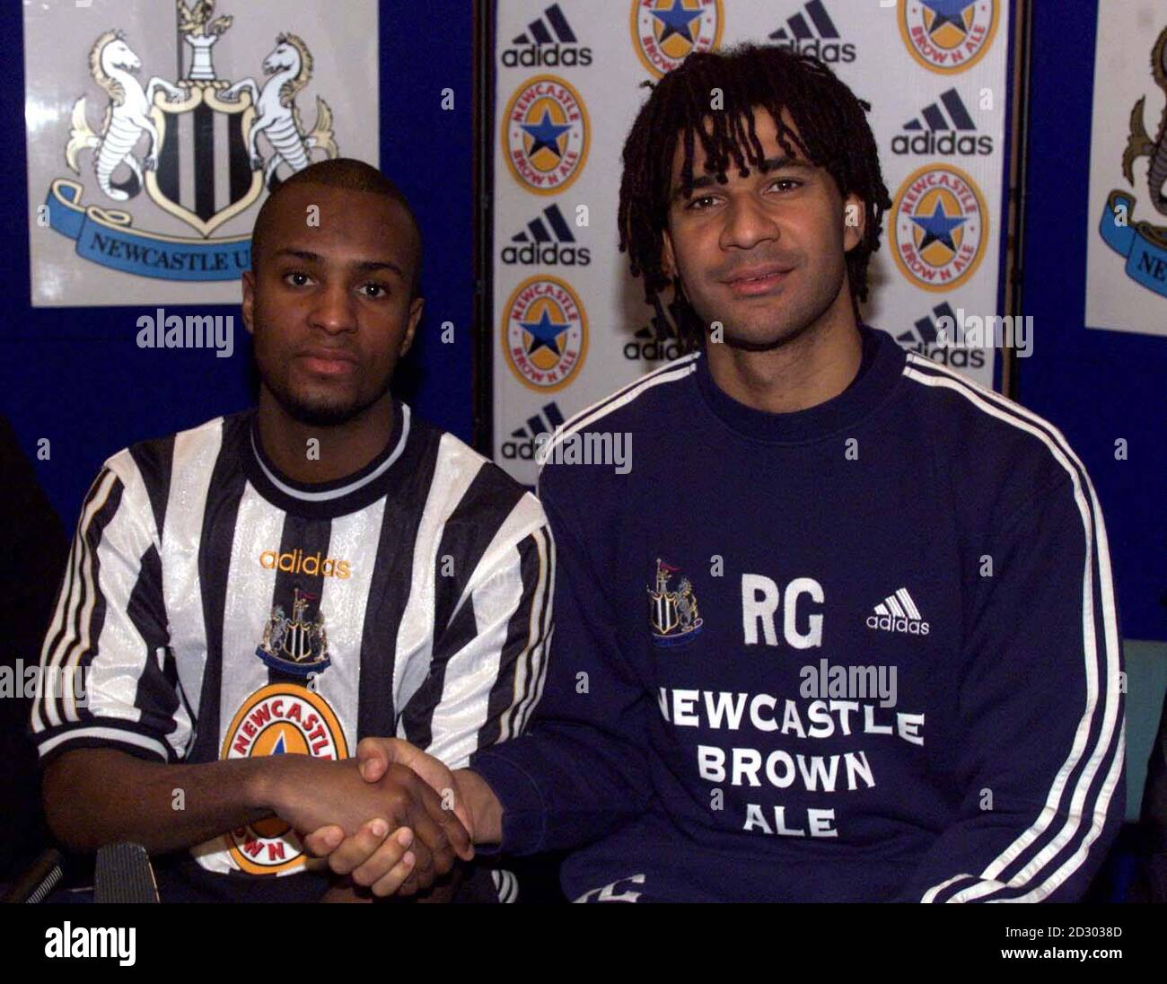 Newcastle United manager manager Ruud Gullit (right) with latest signing  Didier Domi, during a photocall at St James' Park. Domi signed from Paris  St Germain, for a fee of around 4million Stock