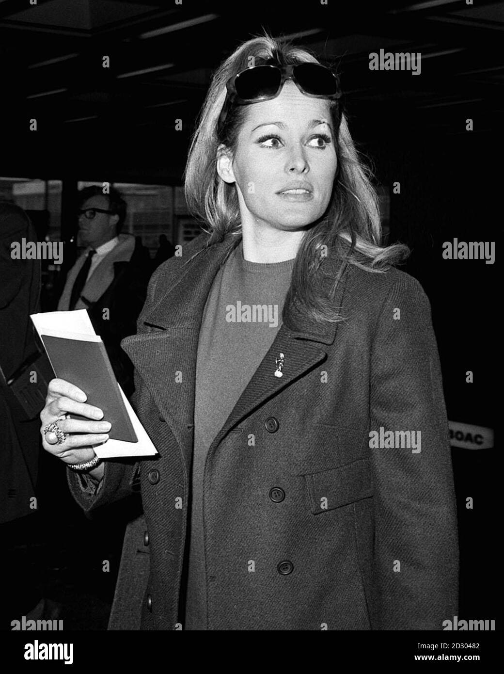 Actress Ursula Andress, at Heathrow Airport, on her way to a South Seas Island after completing work on the James Bond film 'Casino Royale' with Peter Sellers. Stock Photo