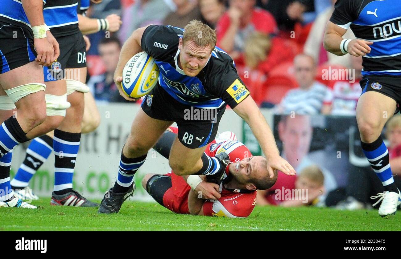 Bath's Ross Batty is tackled by Gloucester's Charlie Sharples during the Aviva Premiership match at Kingsholm Stadium, Gloucester. Stock Photo