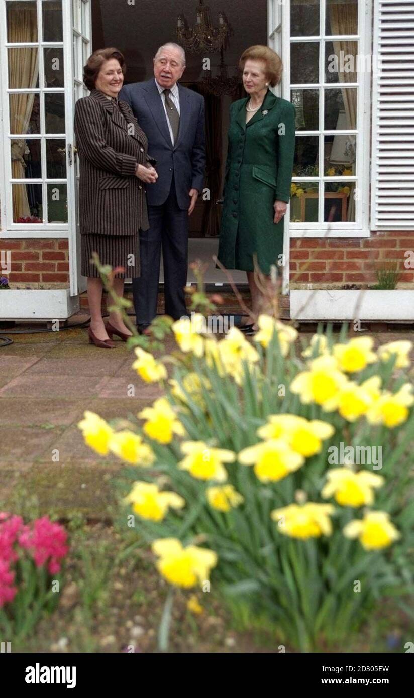 Baroness Thatcher (left) visits General Pinochet (centre) and his wife at their temporary residence where the ex-Chilian President is under house arrest at Wentworth in Surrey. Stock Photo