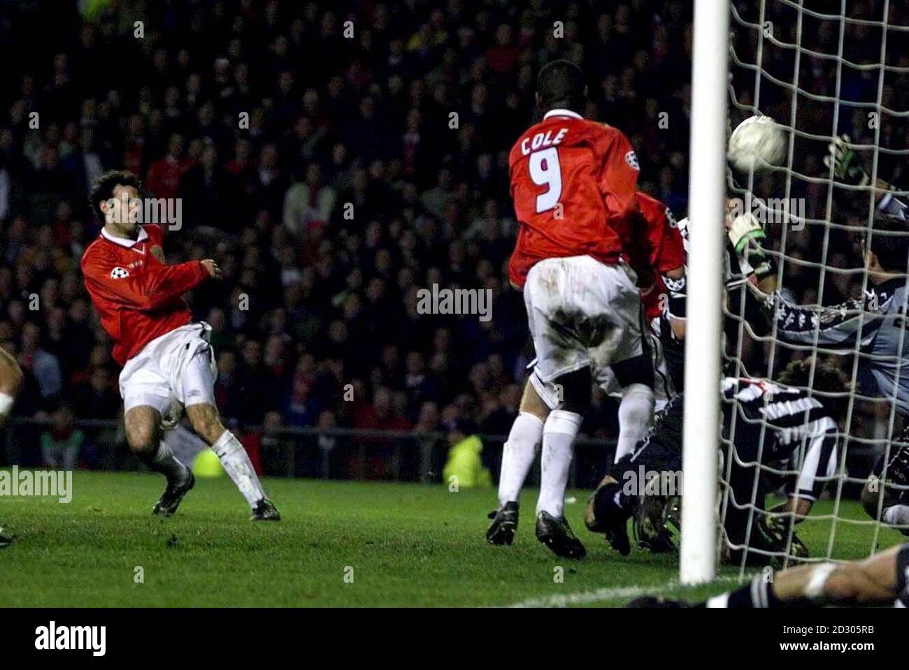 This picture can only be used within the context of an editorial feature.  Manchester United's Ryan Giggs (L) scores the equalizer against Juventus in the UEFA Champions League 1st Leg Semi Final at Old Trafford. Stock Photo