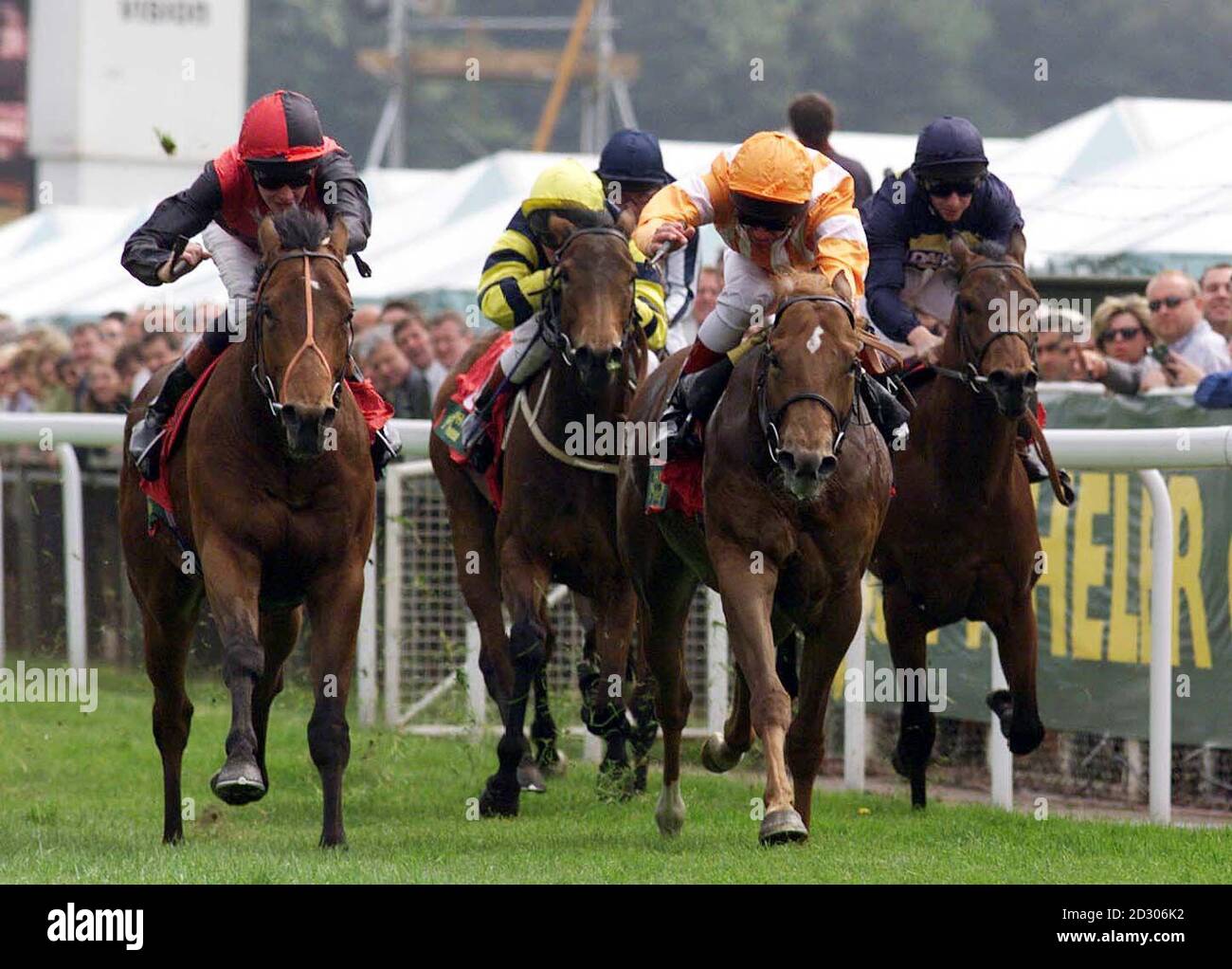 R. Hughes, riding Digital Image (far left), manages to hold off Frankie Dettori, riding Coco de Mer, to win the Joseph Heler Cheshire Cheese Lily Agnes Conditions Stakes on the opening day of the three day race meeting at Chester. Stock Photo