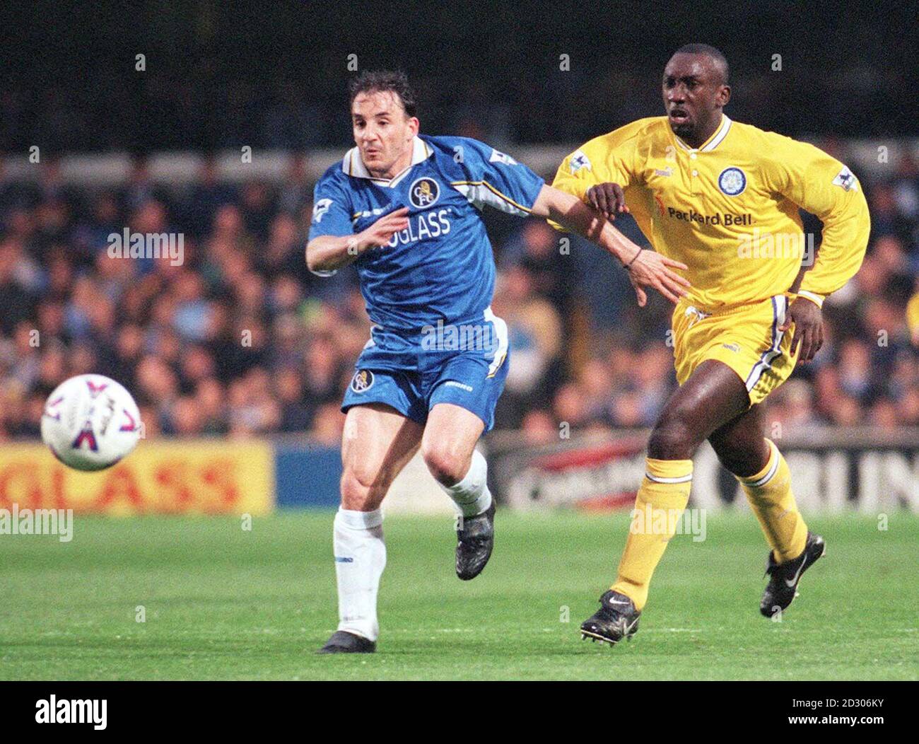 This picture may onlt be used within the context of an editorial feature. Chelsea's Albert Ferrer (left) fends of a challenge from Leed's Jimmy Floyd Hasselbaink during their FA Premiership match at Stamford Bridge, London. Stock Photo