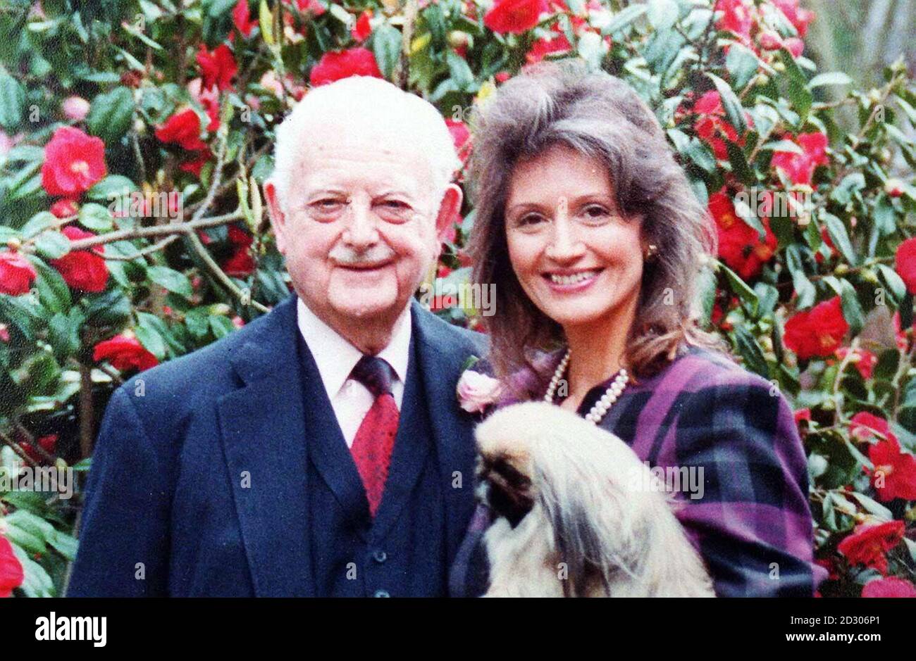 A 1992 wedding day photo of George Clark 77, and his wife Julia 41. Julia, accused of holding her multi-millionaire husband a prisoner in his own home, said she was devastated by a Court of Appeal decision to cut her divorce settlement award from George, aged 85. * George Clark. Julia Clark. Stock Photo