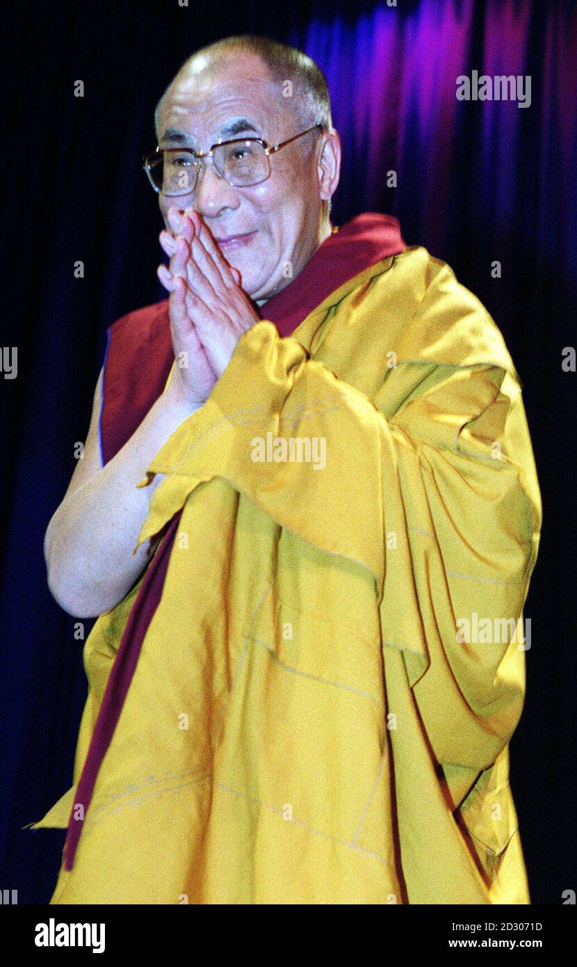 The Dalai Lama attends a three day teachings on Tibetan Buddist writings called 'Transforming the Mind' conference at Wembley Conference Centre in London. Stock Photo