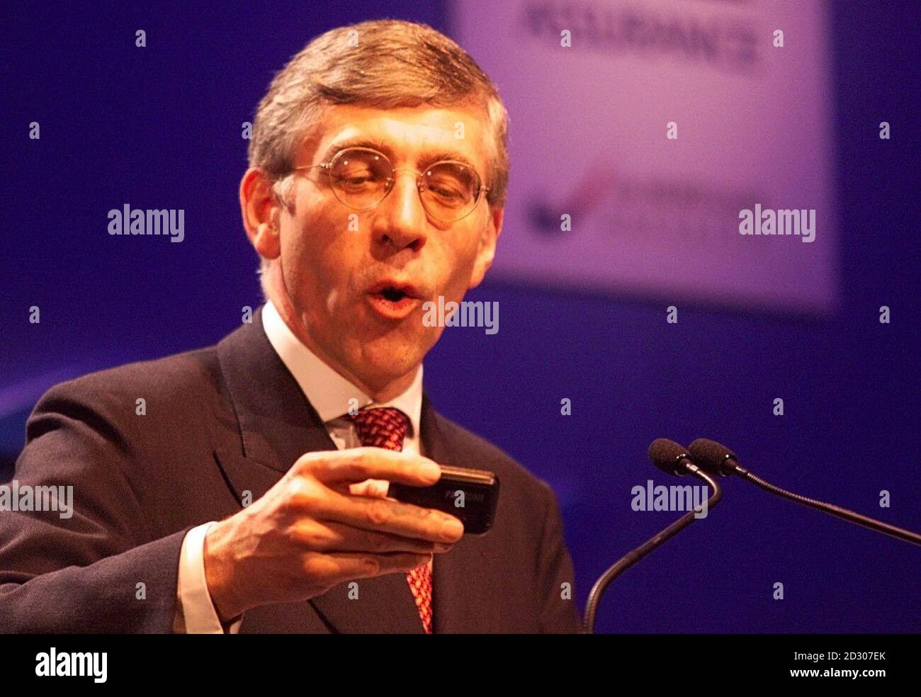 Home secretary Jack Straw, is interrupted by a pager message from the Labour party chief whip, during his address of the Police Federation Annual Conference, at the Winter Gardens, Blackpool. Stock Photo