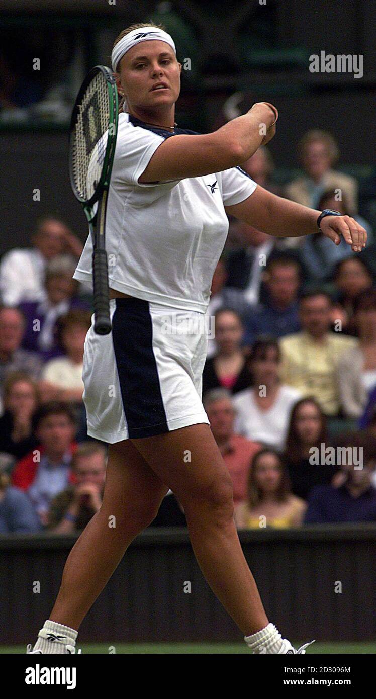 No Commercial Use. South African Mariaan De Swardt shows her frustation after losing to Germany's Steffi Graf at Wimbledon. Graf defeated De Swardt 4-6, 6-3, 6-2. Stock Photo