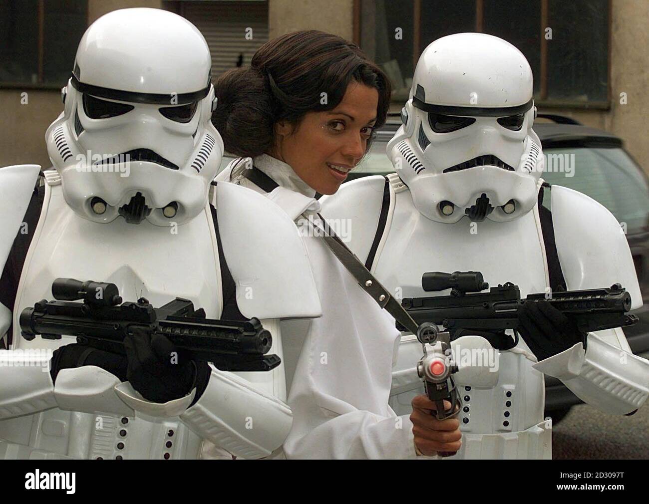 TV presenter Jenny Powell, dressed as Princess Leia from Star Wars Iis flanked by Stormtroopers, at the launch of the Kellogs Star Wars roadshow, which started in Manchester before heading off on a European tour. Stock Photo