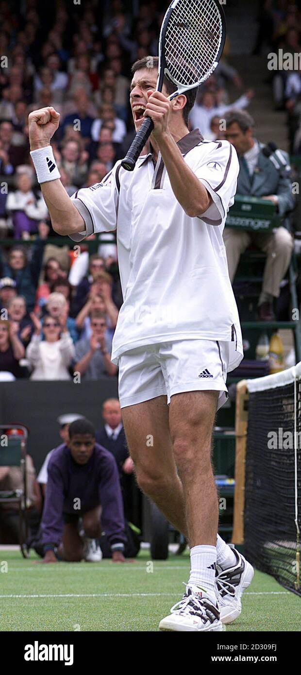No Commercial Use: Tim Henman celebrates winning a game during his fourth-round match against America's Jim Courier on Centre Court at the 1999 Wimbledon tennis championship. Stock Photo
